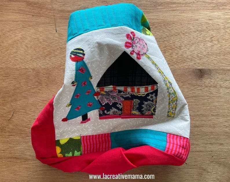 flipping the quilted Christmas pillow inside out 