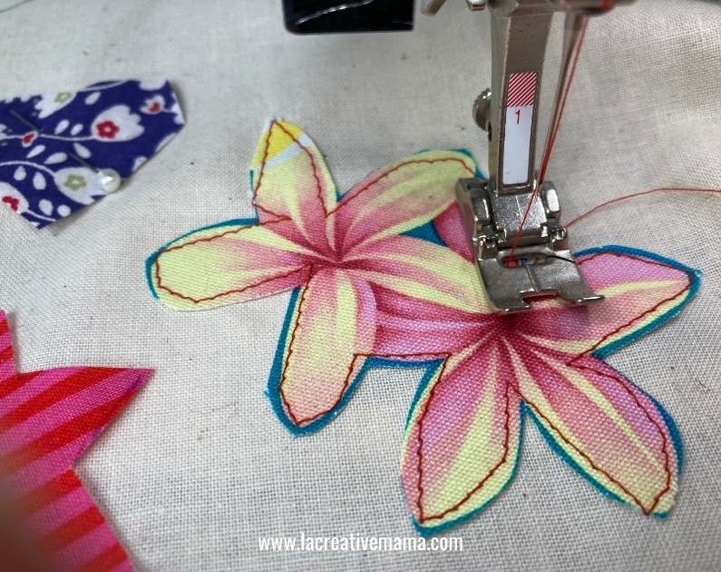 sewing around the applique pattern 