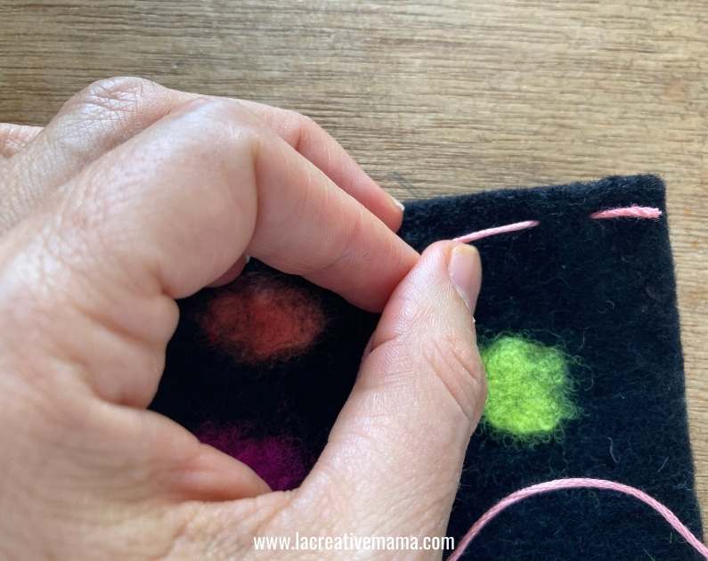 embroidered felt using a backstitch 