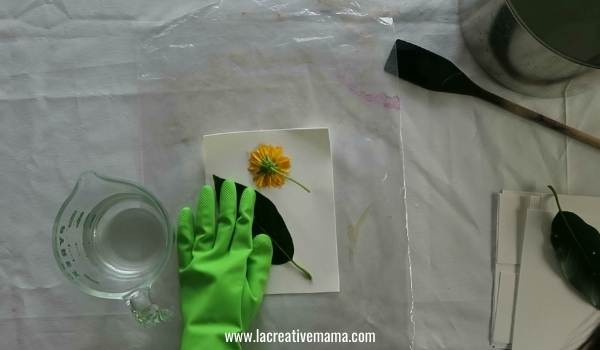 making an eco print bundle of paper 