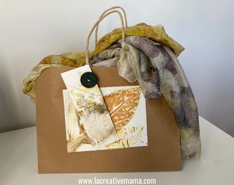 upcycled paper bag decorated with eco printed paper. It makes a lovely gift bag 