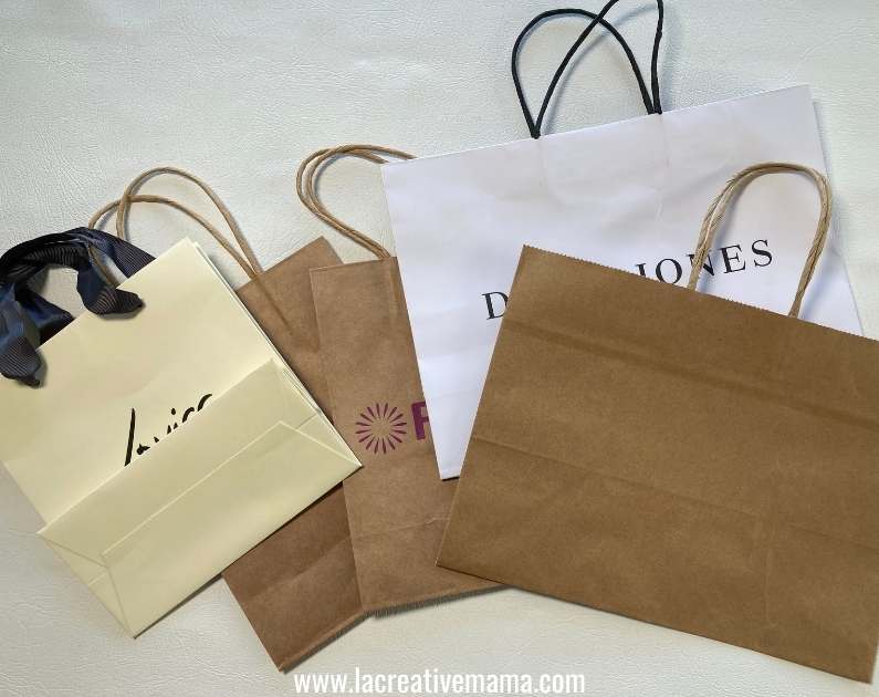 paper bags in different colors. These are recycled bags from different shops and from the supermarket