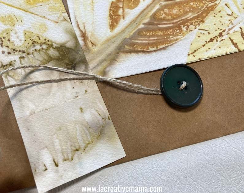 using upcycled buttons to include in the eco printed gift wrapping 