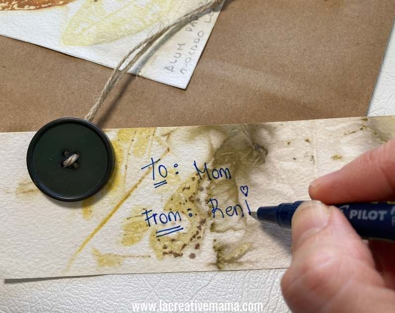 writing a message on the eco printed tag 