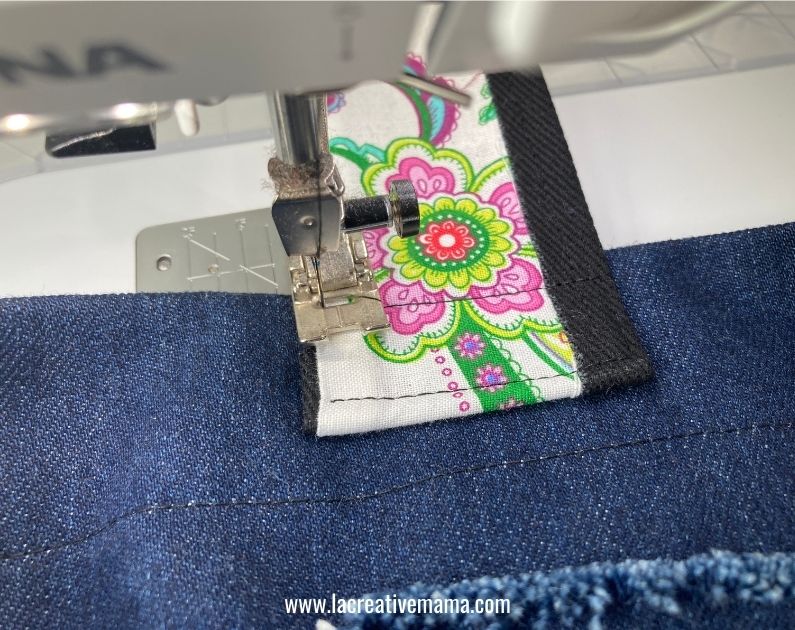 sewing the handles to the bag 