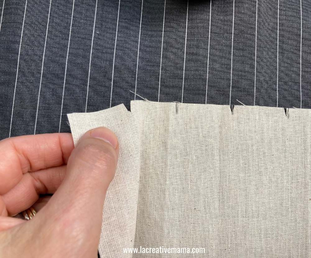 folding the fabric to create the pleats 