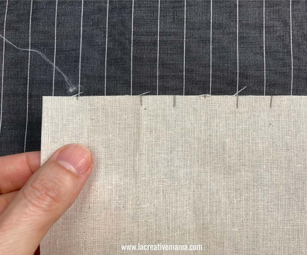 marking the calico fabric to make the inverted pleats 