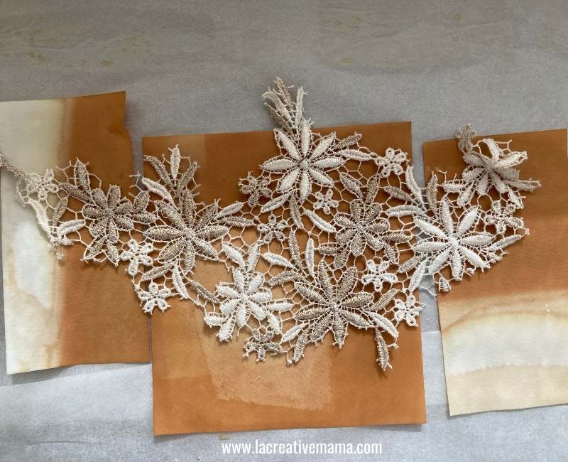using lace to create texture on a tea dyed paper 