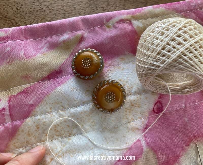 adding vintage buttons to the diy purse 