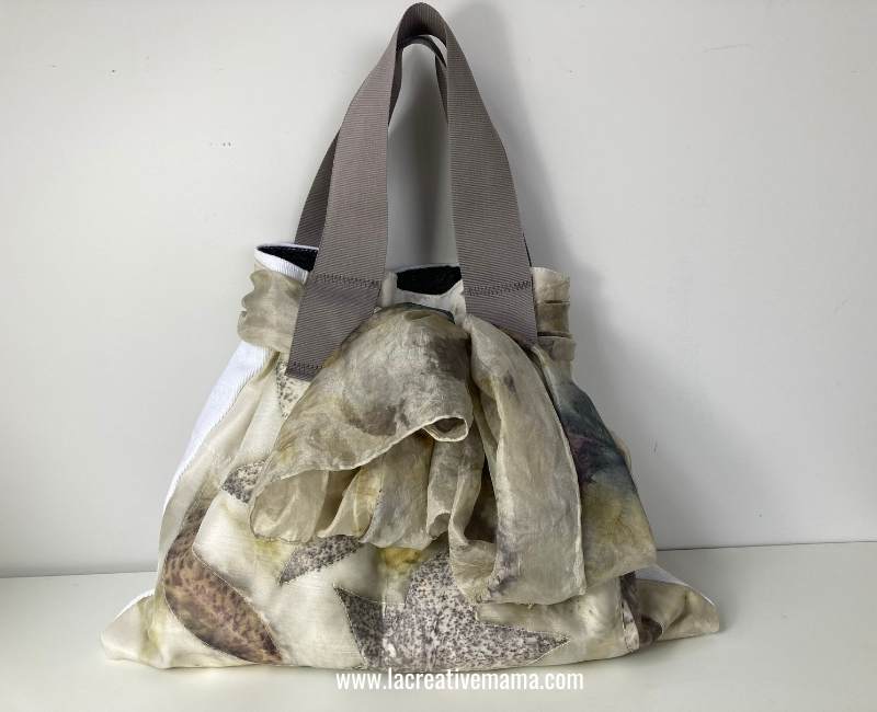 another finished drawstring bag using eco printed fabric and an eco printed silk scarf as the drawstring. 