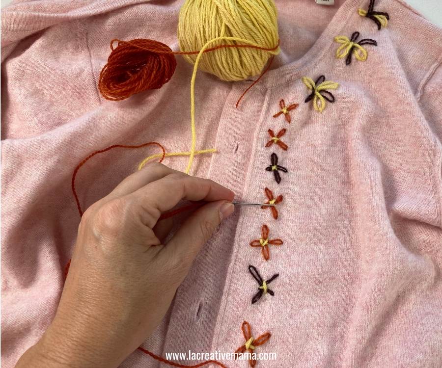embroidering a cardigan to upcycle it 