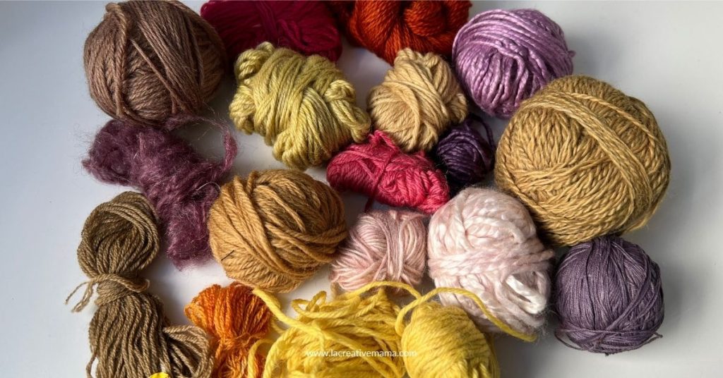 a variety of bright reds, pinks, yellows and purples on naturally dyed wool yarn using natural dyes