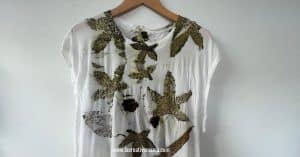 an eco printed t-shirt using dried leaves and flowers