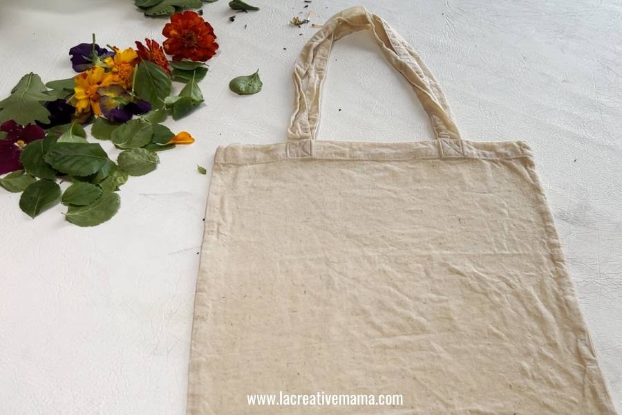 a mordanted cotton tote bag on a table 