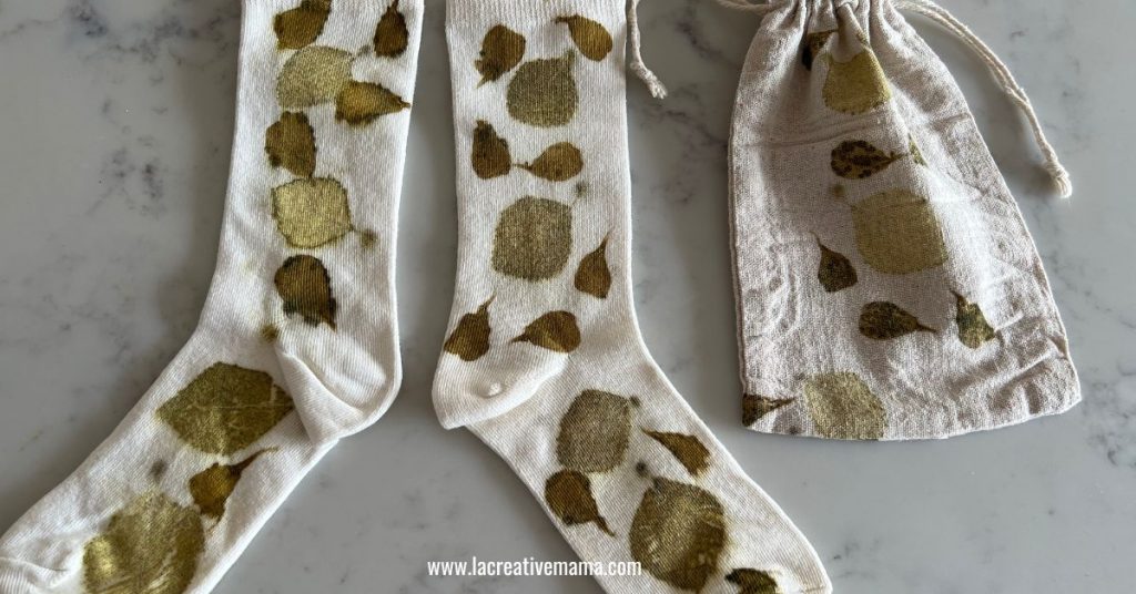 eco printed socks and gift bag using marigold petals and birch leaves 