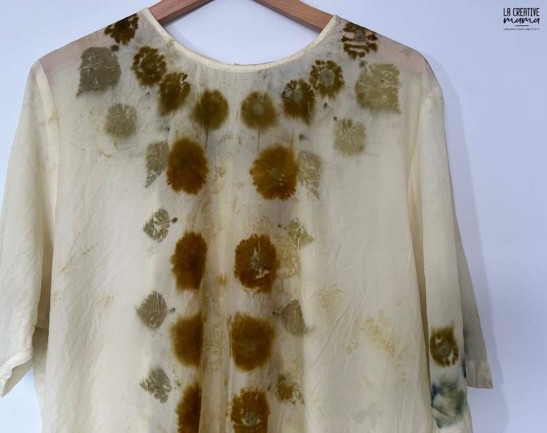 a silk top which was eco printed using coreopsis flowers and birch leaves 