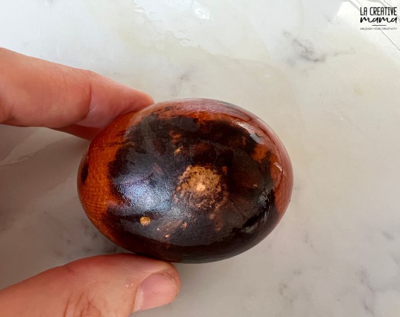 easter egg printed with coreopsis flower dipped in iron 