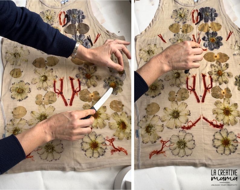 Removing the cosmos flowers and silver dollar leaves from the eco printed top