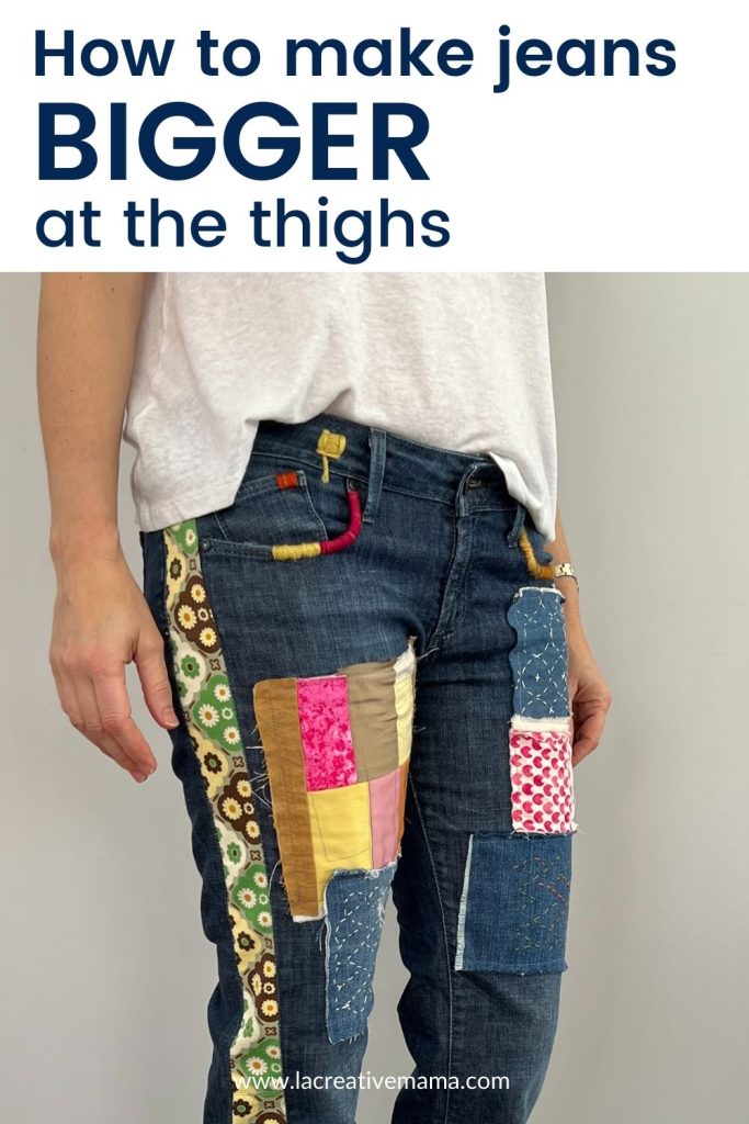 a photo of a pair of jeans which were re sized up 2 sizes so that they fir around the waist and thighs. It shows the extra panel of fabric that was added on each side of the legs. 