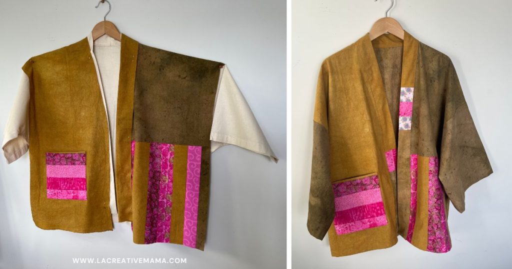 Kimono-style jacket in mustard yellow and olive green fabrics, featuring strips of pink patchwork detail at the front hem and a pocket.