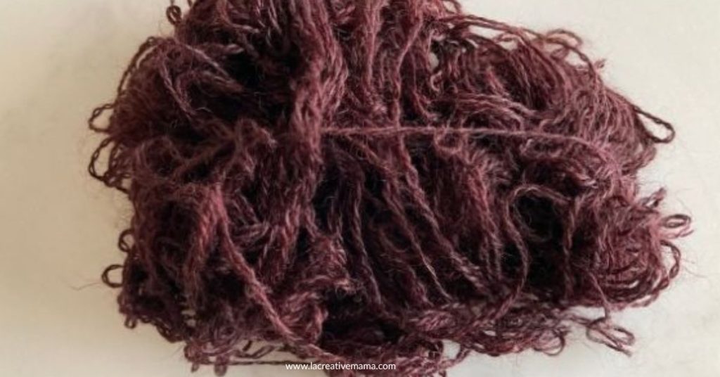 dark purple color wool yarn dyed with logwood dye. 